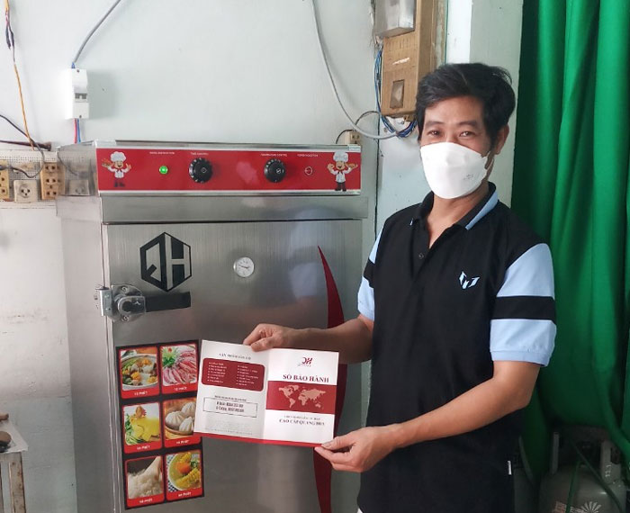 Hình ảnh khách hàng mua tủ cơm công nghiệp Quang Huy 1