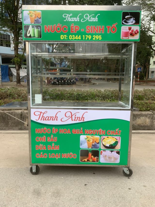 Xe b&aacute;n nước &eacute;p m&agrave;u xanh l&aacute;